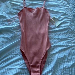 Pink bodysuit